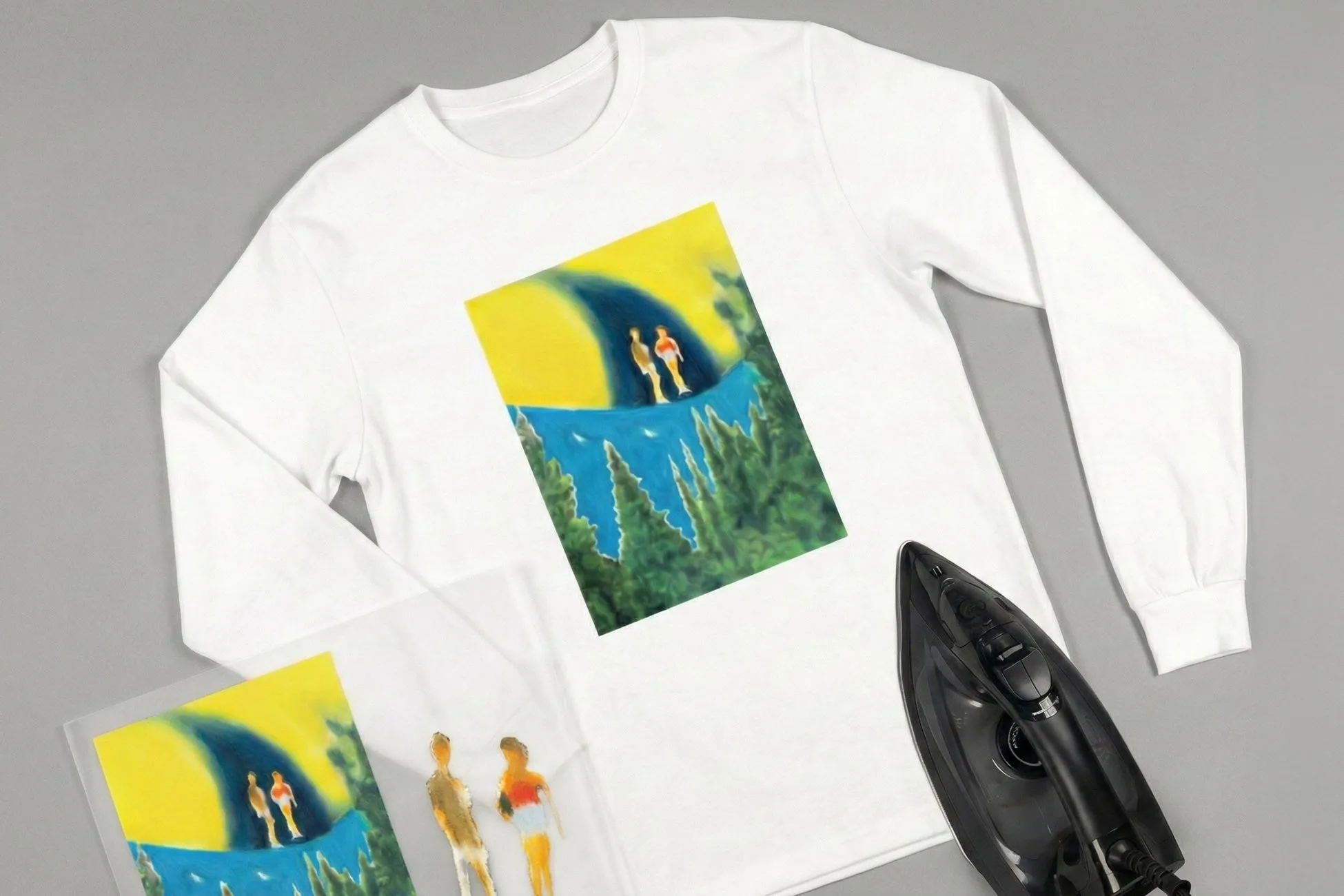白い長袖Tシャツに風景画プリント、透明シート、アイロン