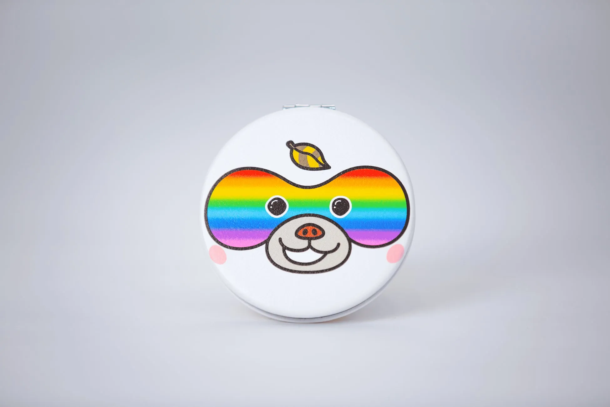 虹色のゴーグルをつけたキャラクターのコンパクトミラー